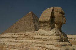 The Sphinx with Khufus Pyramid in the background