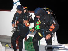 Maz & Alex kitting up for a night dive