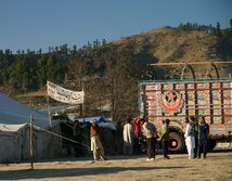 Supplies are unloaded at a relief camp