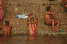 A pilgrim saying his prayers in the Ganges