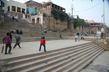 Boys playing cricket on the ghat