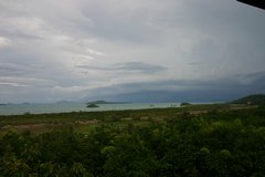 The islands east from mainland Ko Lanta under a menacing sky