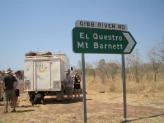The start of the Gibb River Road and tour bus with puncture