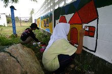 survivors of the tsunami rebuild their schools